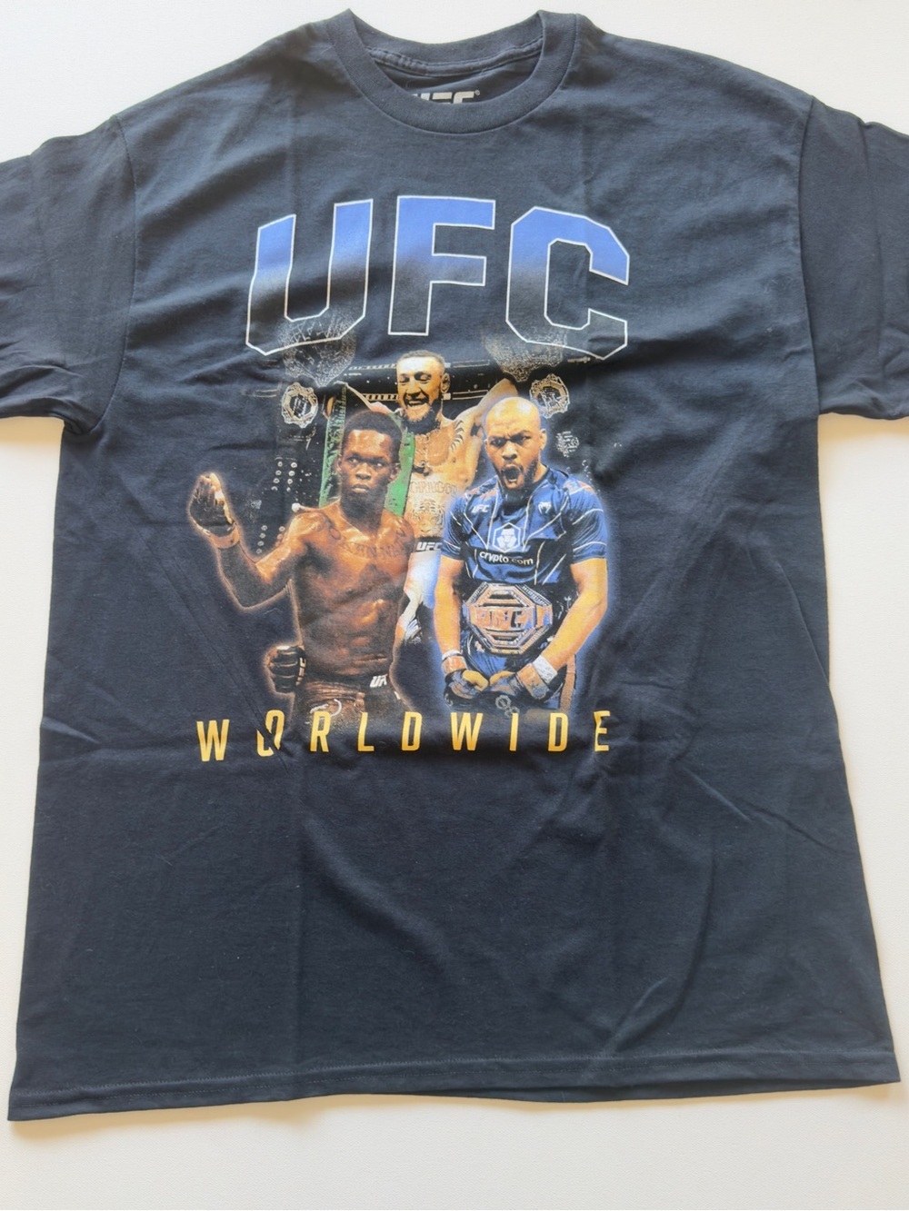 NWOT Men's UFC Worldwide Graphic Tee Black with Blue & Yellow Print Size L (KB9)